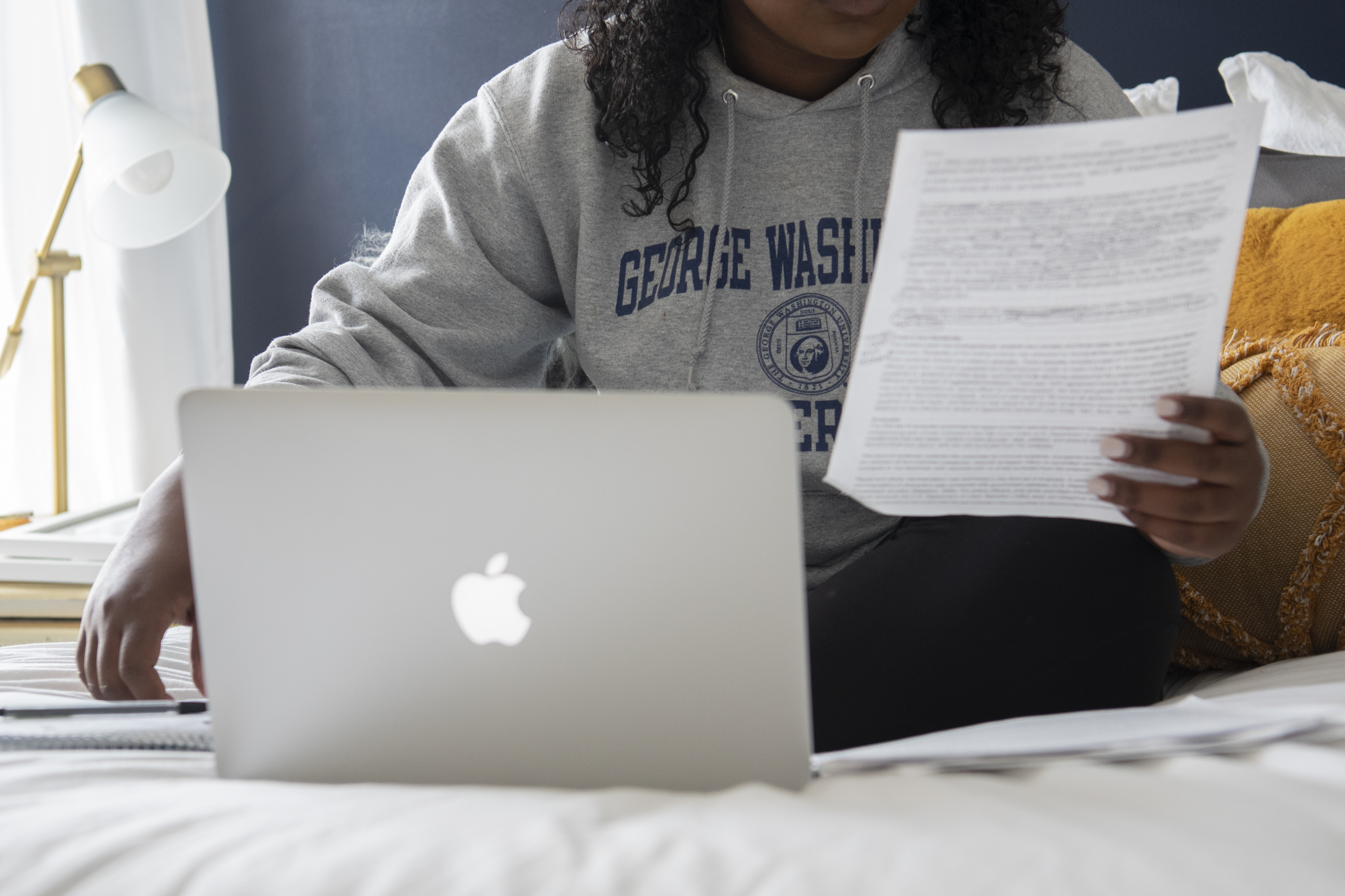 Student sitting in front of computer.