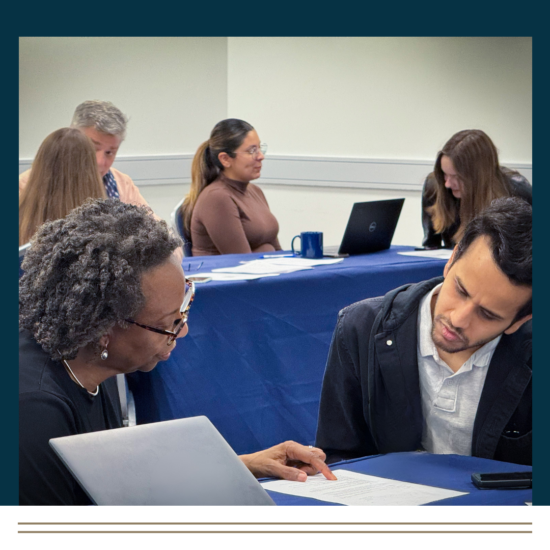 Career coaching session with a career coach reviewing the resume of a student